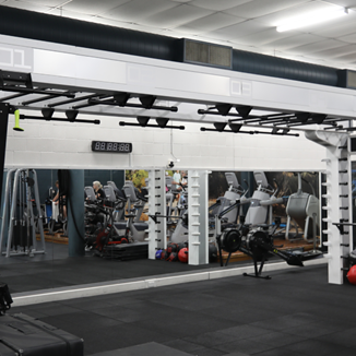 A photo of a Queenax machine within the venue gym